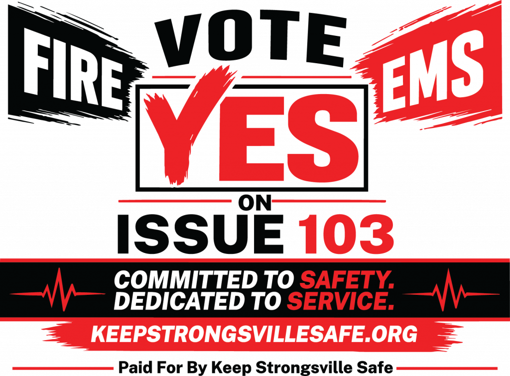 Yard sign reading Fire EMS, Vote Yes on Issue 103, committed to safety, dedicated to service